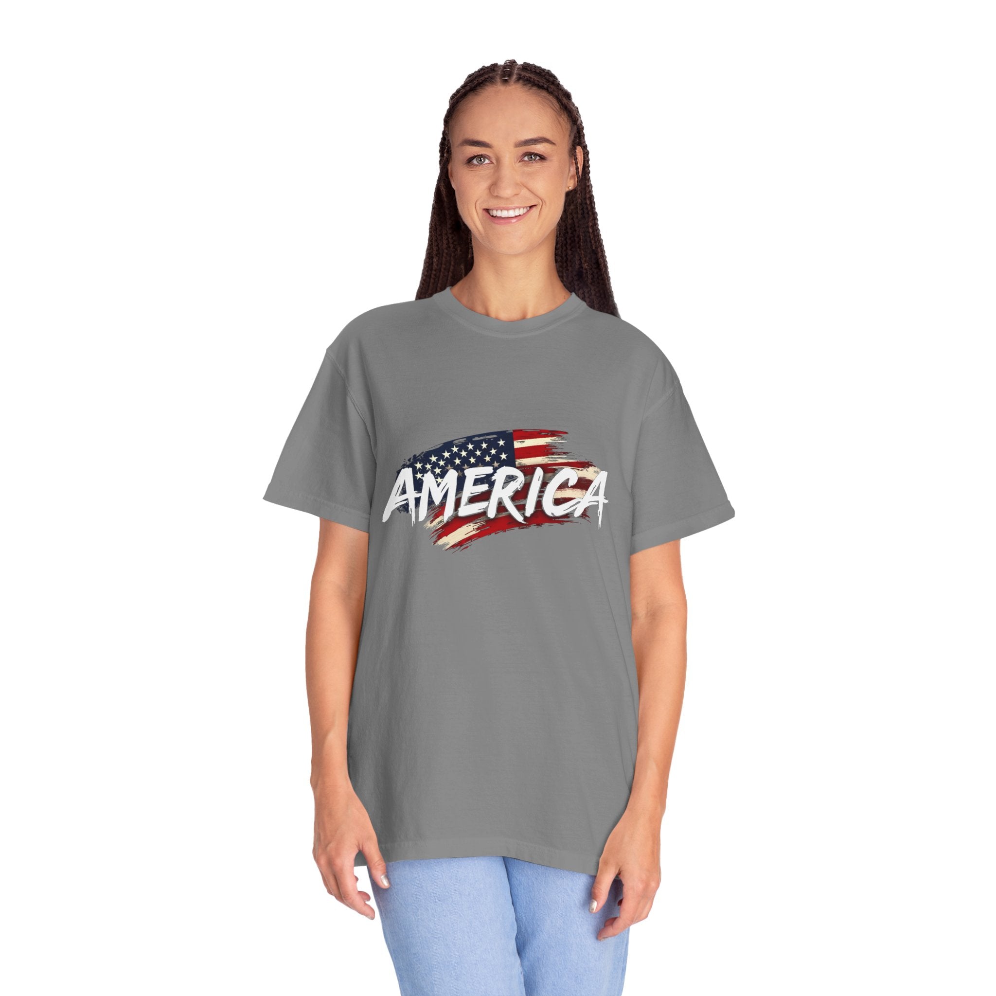 Person wearing a gray t-shirt with 'AMERICA' and an American flag design on a white background