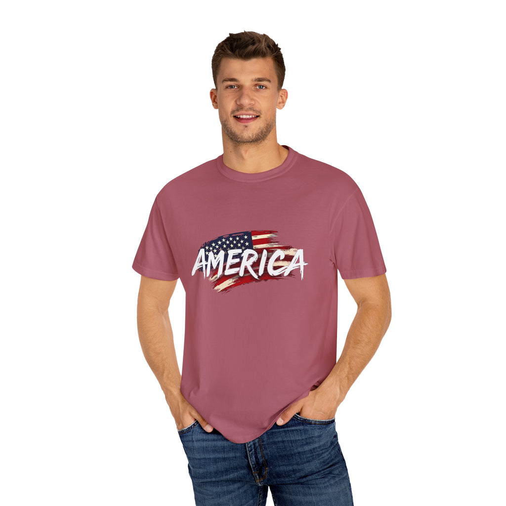 Man wearing a maroon t-shirt with 'AMERICA' and an American flag design on a white background