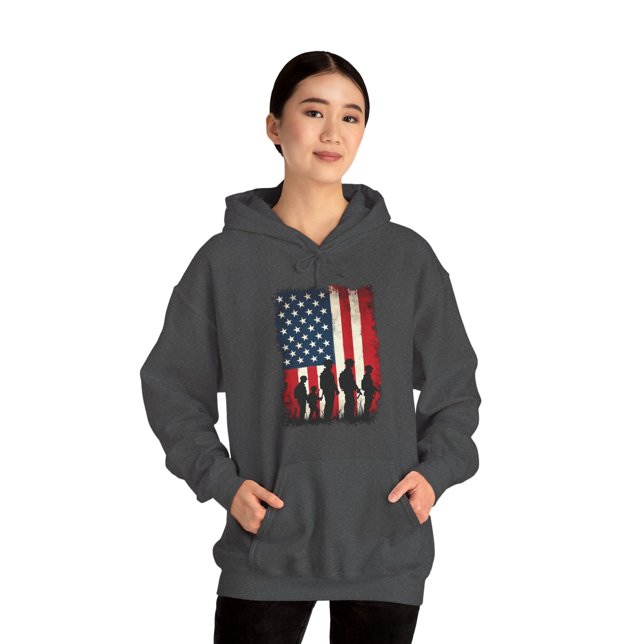 Person wearing a gray hoodie with an American flag design on a white background