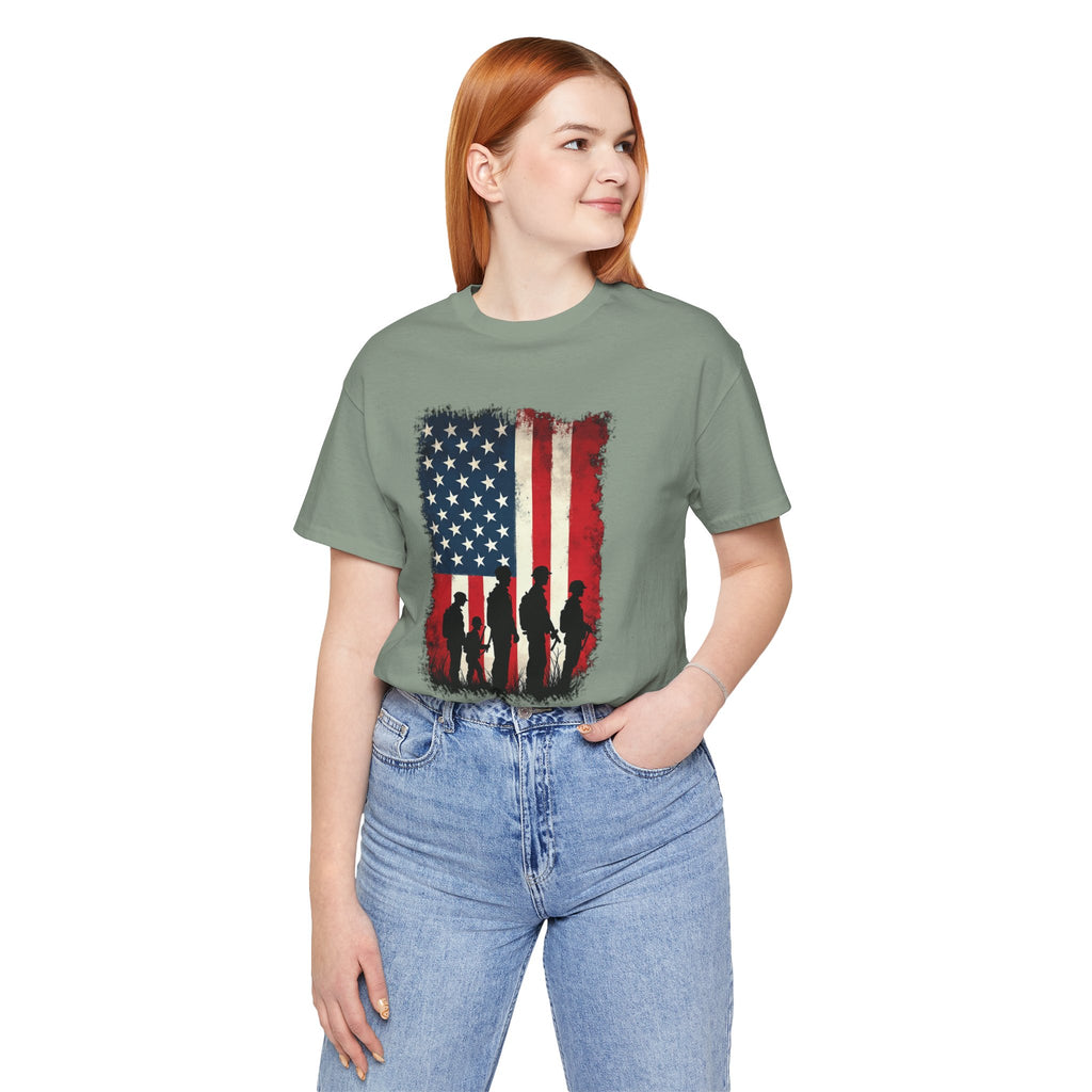 Person wearing a green t-shirt with an American flag design and silhouettes of people on a white background