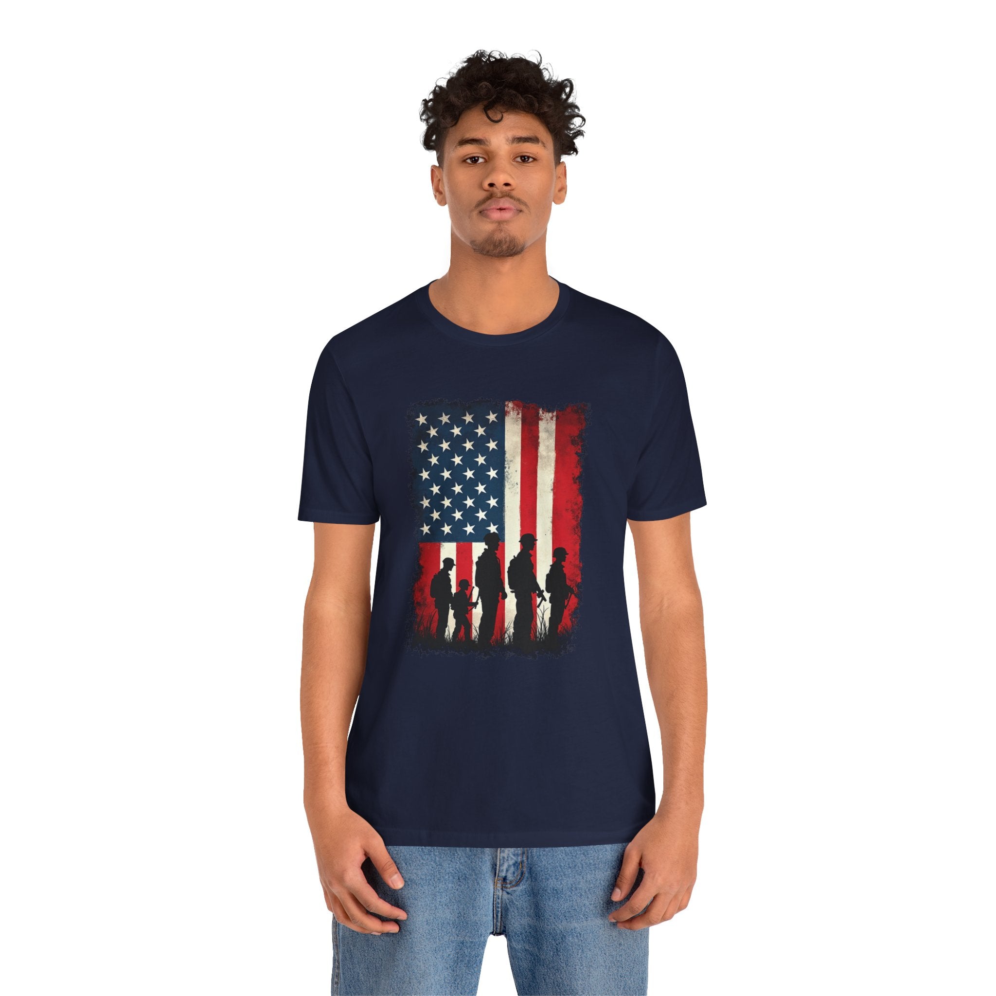 Person wearing a navy blue t-shirt with an American flag design on a white background