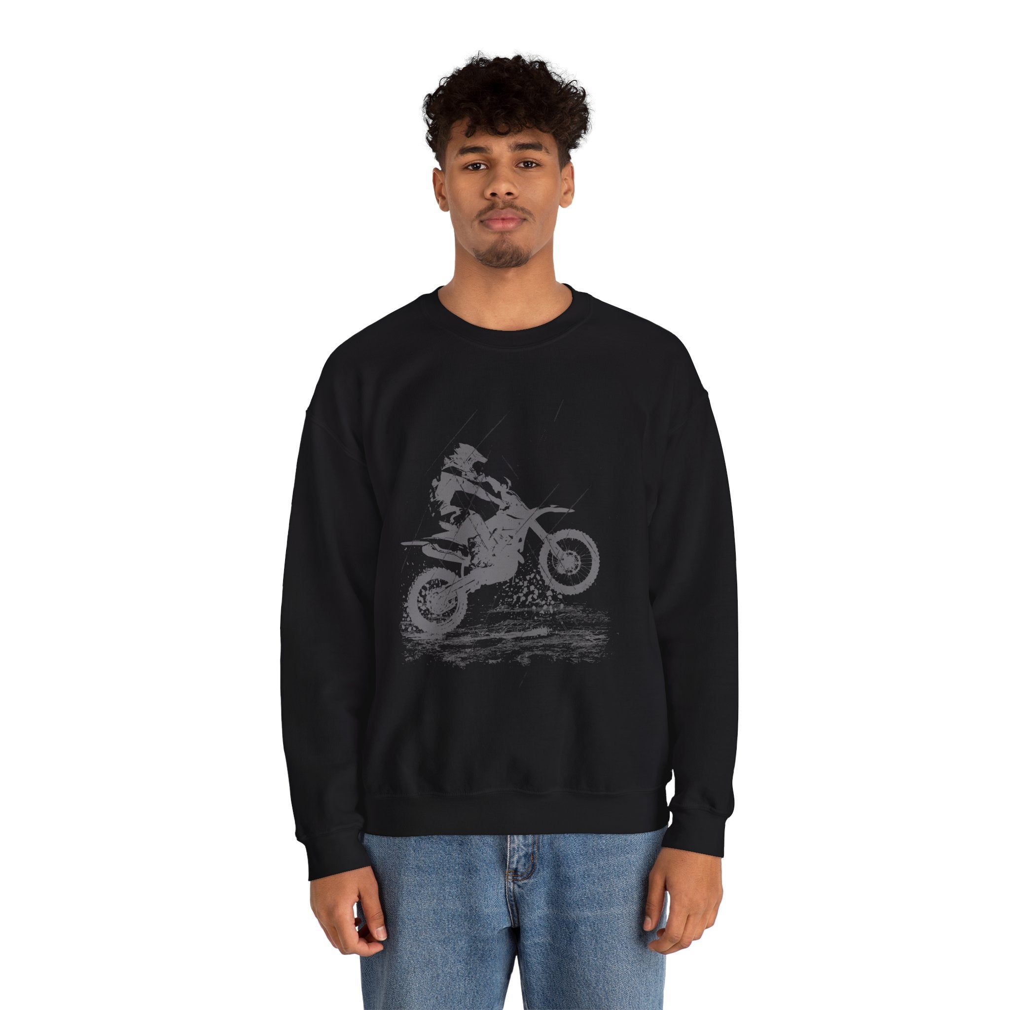 Person wearing a black sweatshirt with a graphic design on a white background