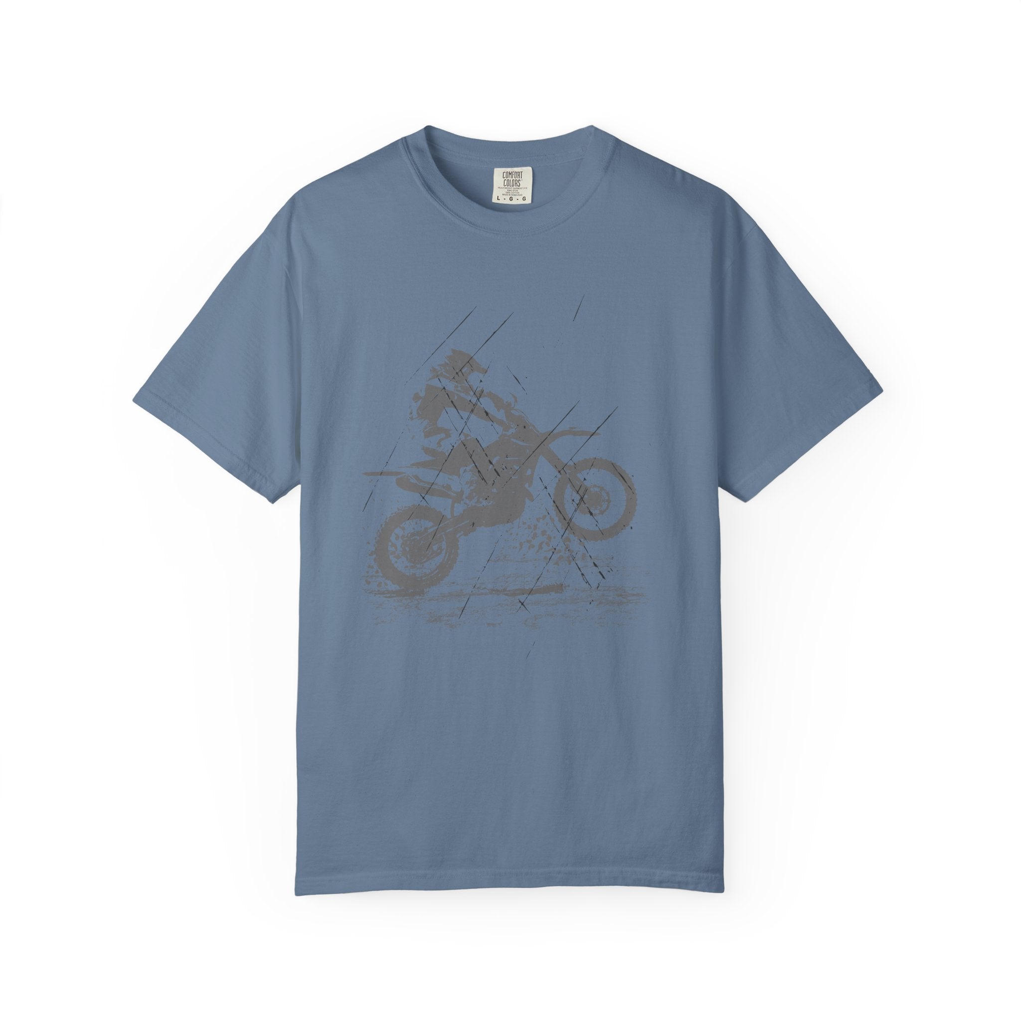 Blue jean t-shirt with a vintage graphic of a person on a muddy motorcycle  on a white background