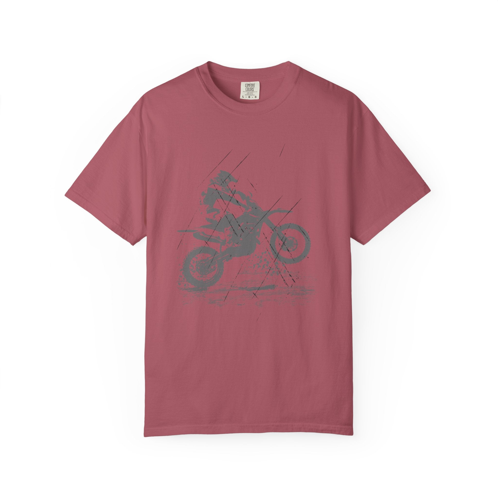 Crimson maroon t-shirt with a vintage graphic of a person on a muddy motorcycle  on a white background