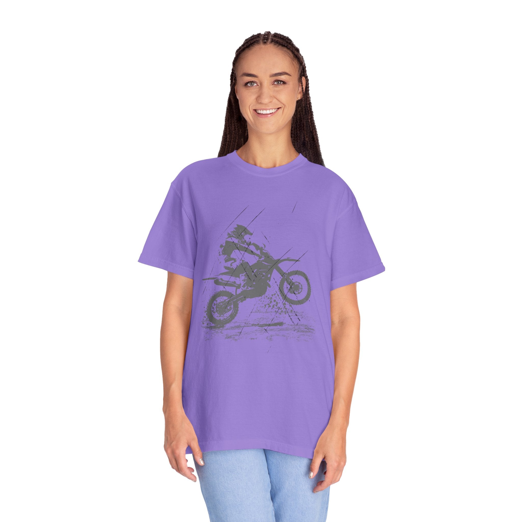 Person wearing a purple t-shirt with a graphic design on a white background