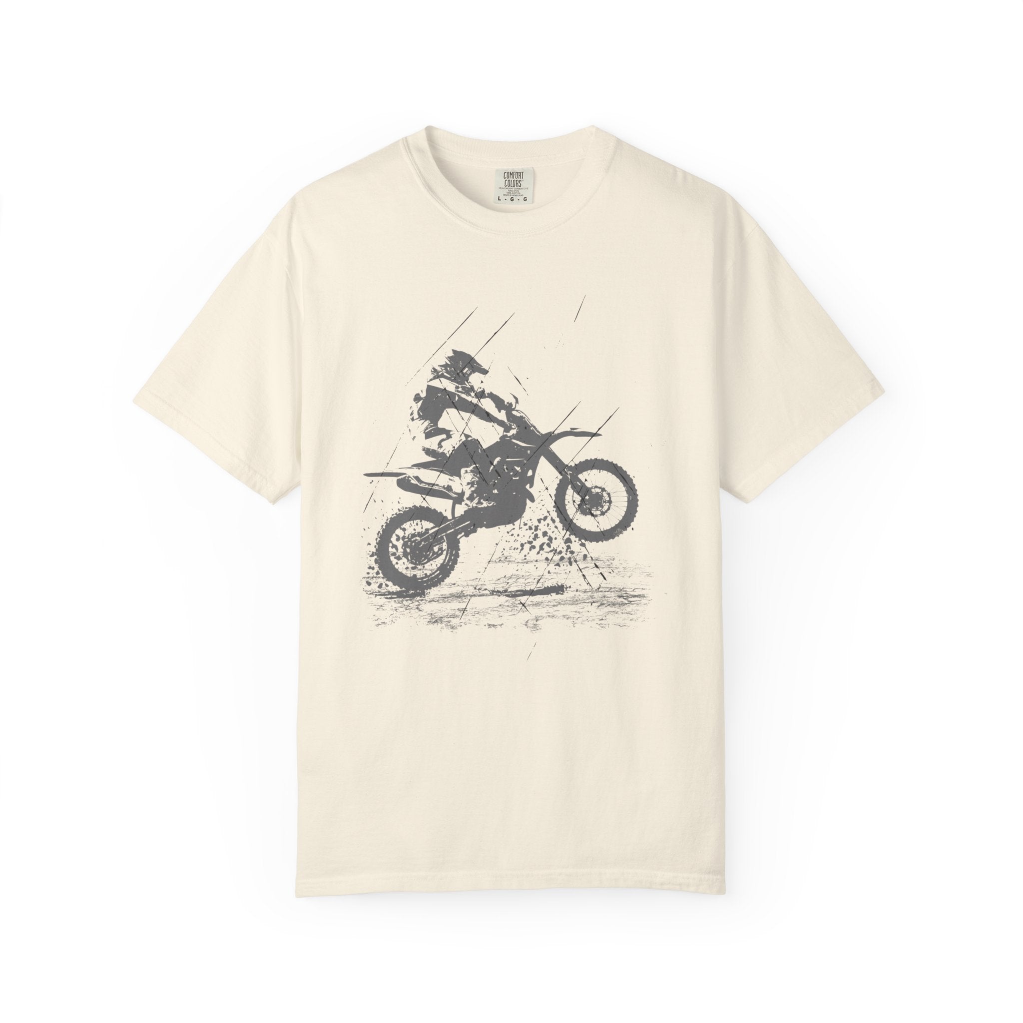 Ivory beige t-shirt with a vintage graphic of a person on a muddy motorcycle  on a white background