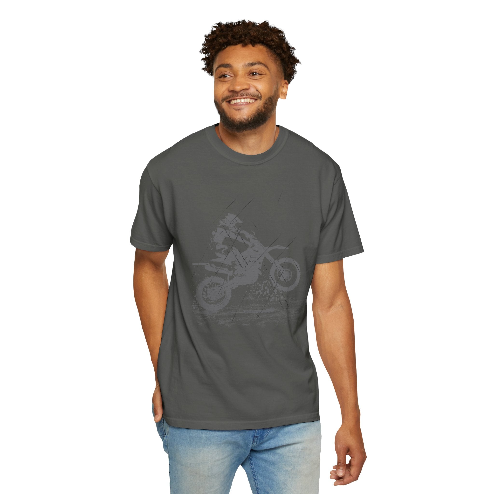 Man wearing a gray t-shirt with a graphic design on a white background