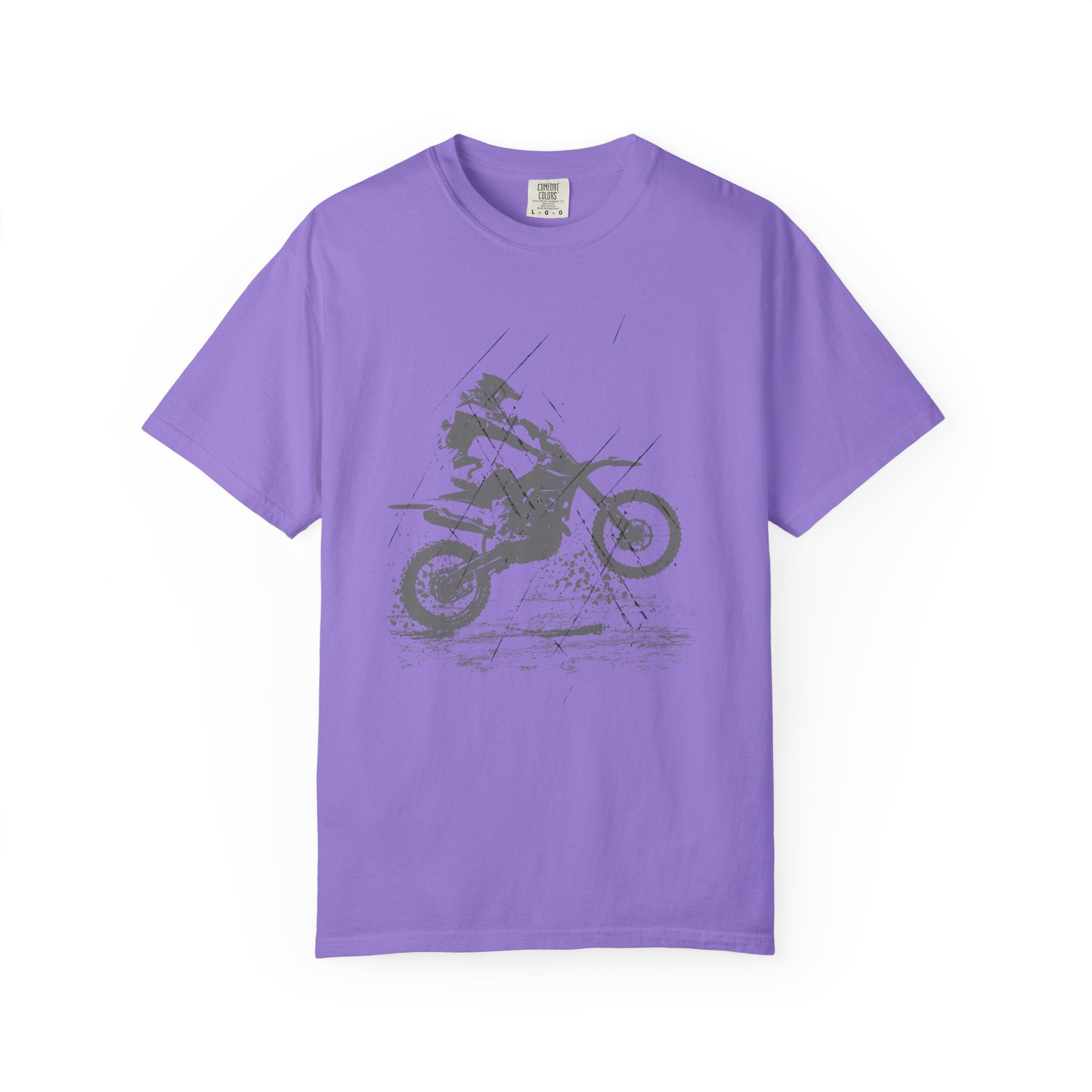 Purple t-shirt with a vintage graphic of a person on a muddy motorcycle  on a white background