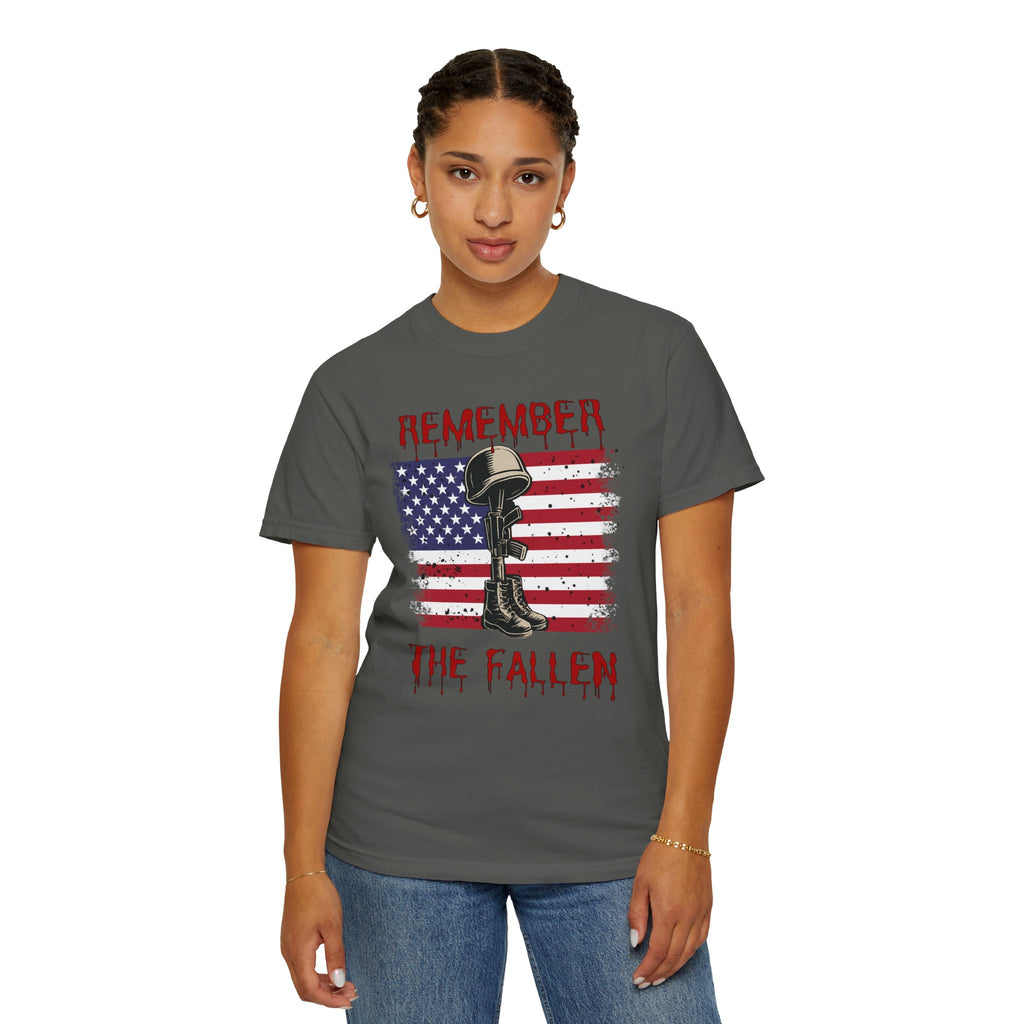 Person wearing a gray t-shirt with a graphic design and text on a white background