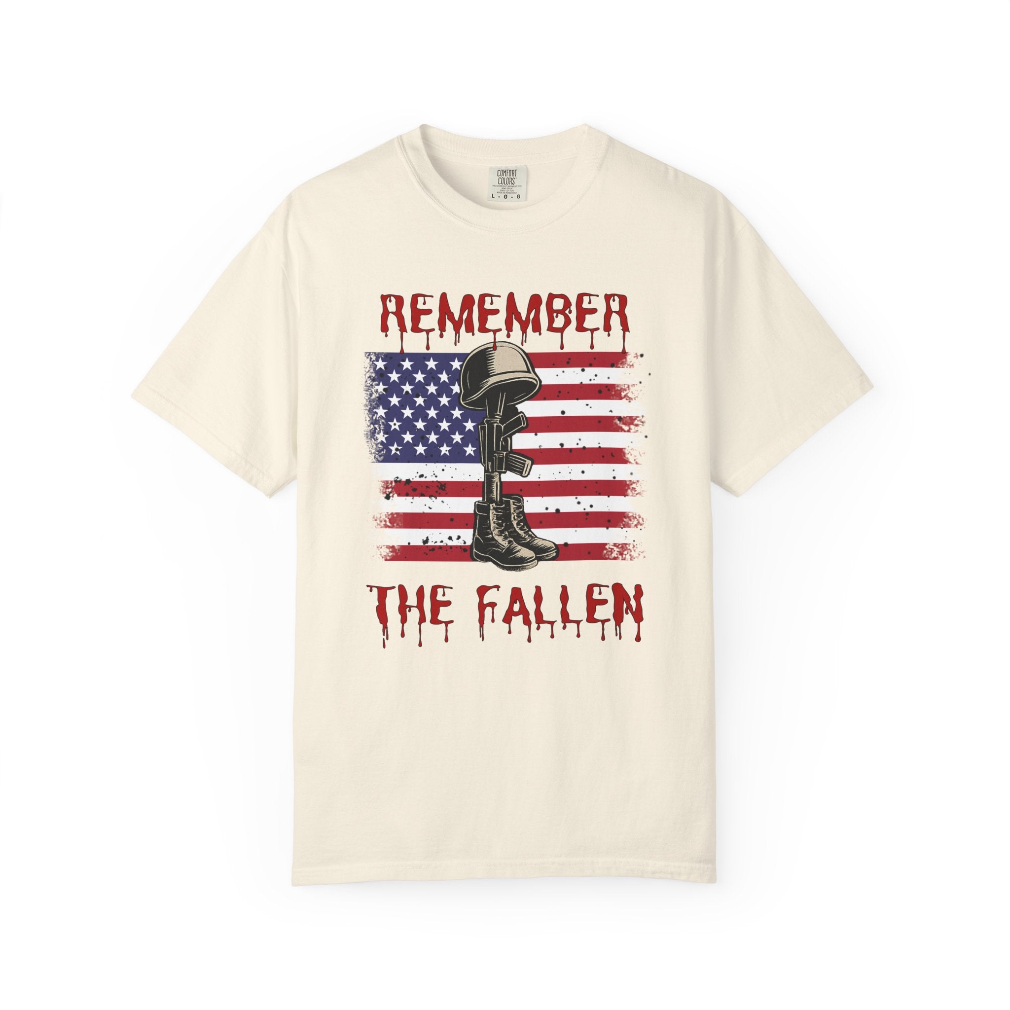 Beige t-shirt with American flag and military boot graphic, featuring 'Remember the Fallen' text.