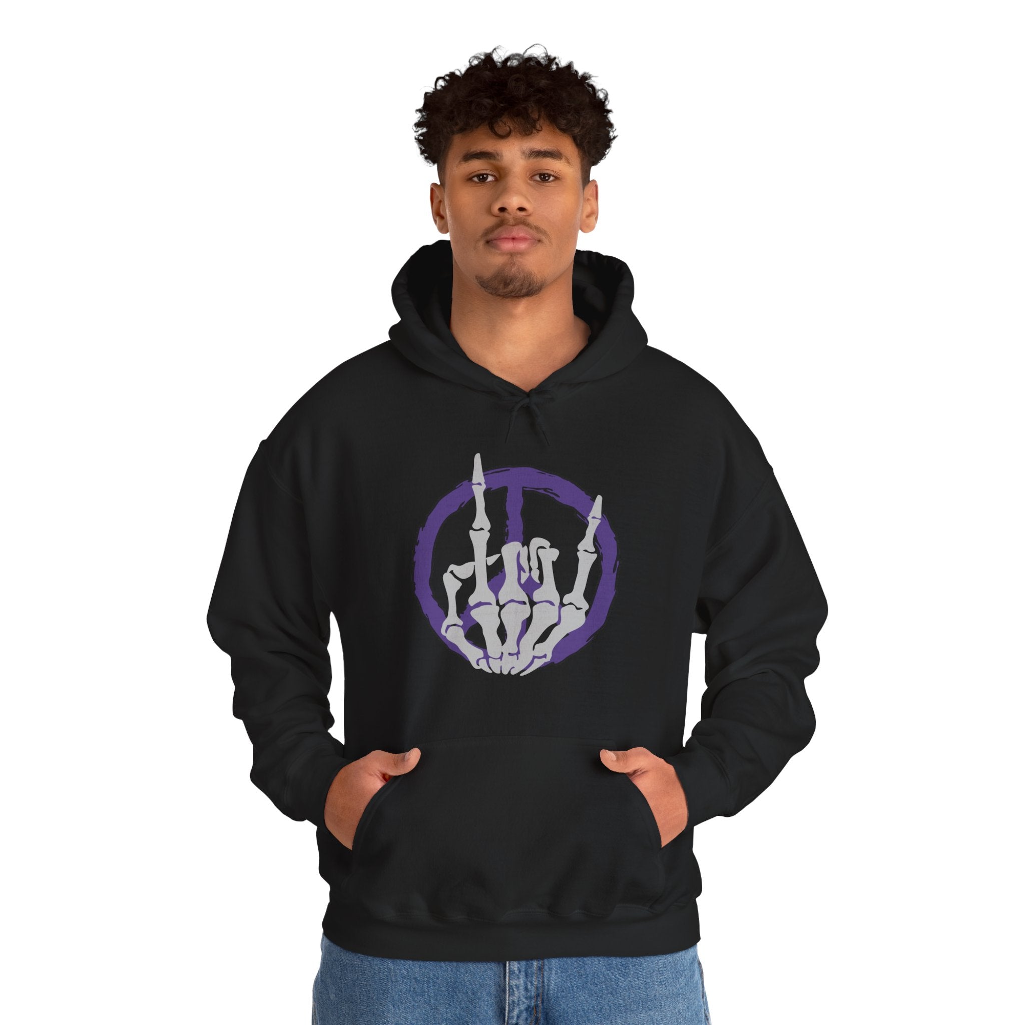 Person wearing a black hoodie with a unique design on a white background