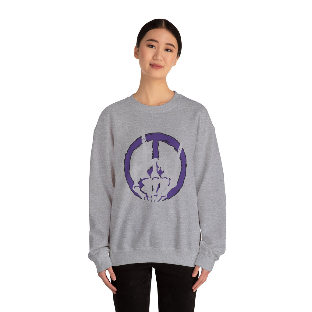 Person wearing a gray sweatshirt with a purple graphic design on a white background