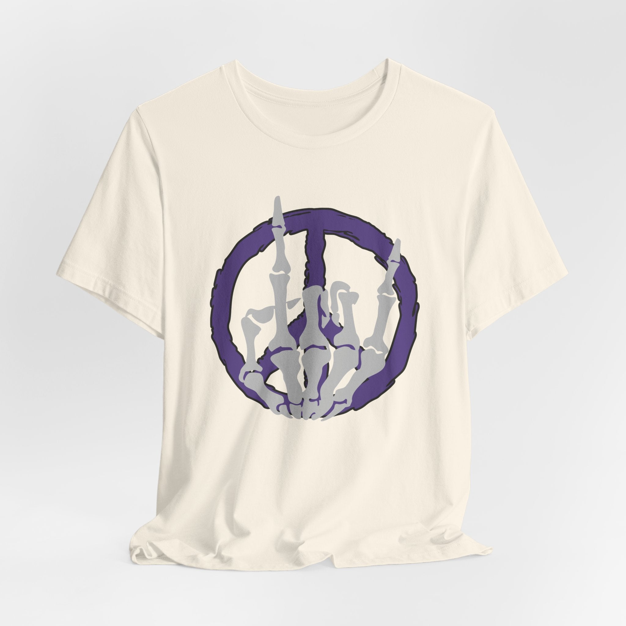Ivory beige t-shirt with a cool skeleton symbol in a purple peace sign design on a light gray background