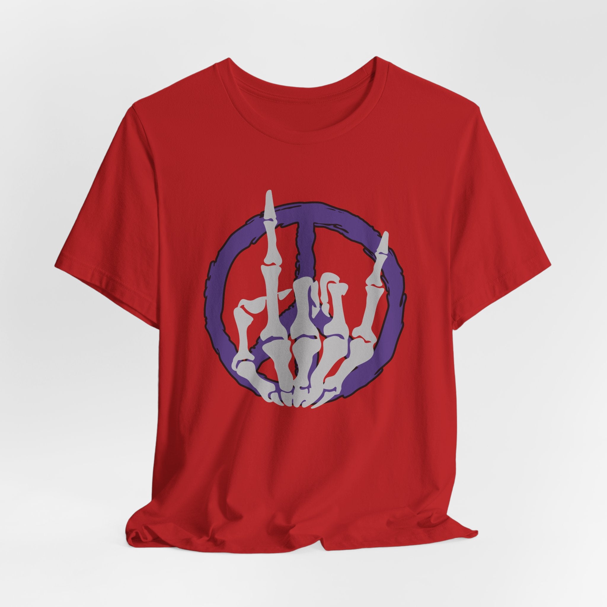 Red t-shirt with a cool skeleton symbol in a purple peace sign design on a light gray background