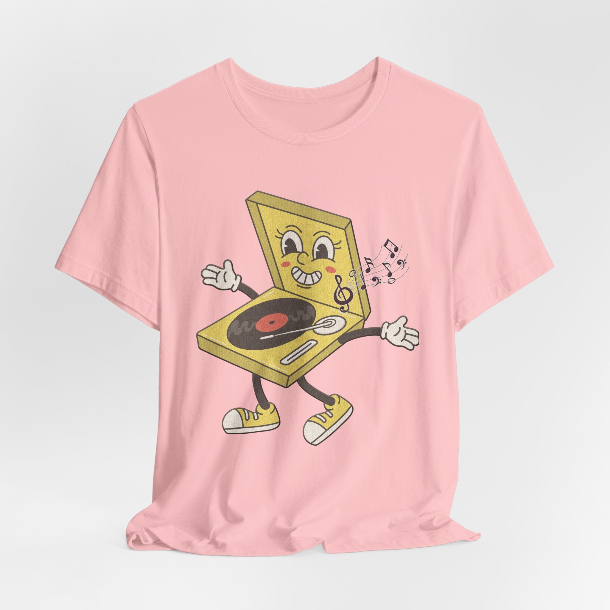 Pink t-shirt with a cartoon record player design on a light gray background