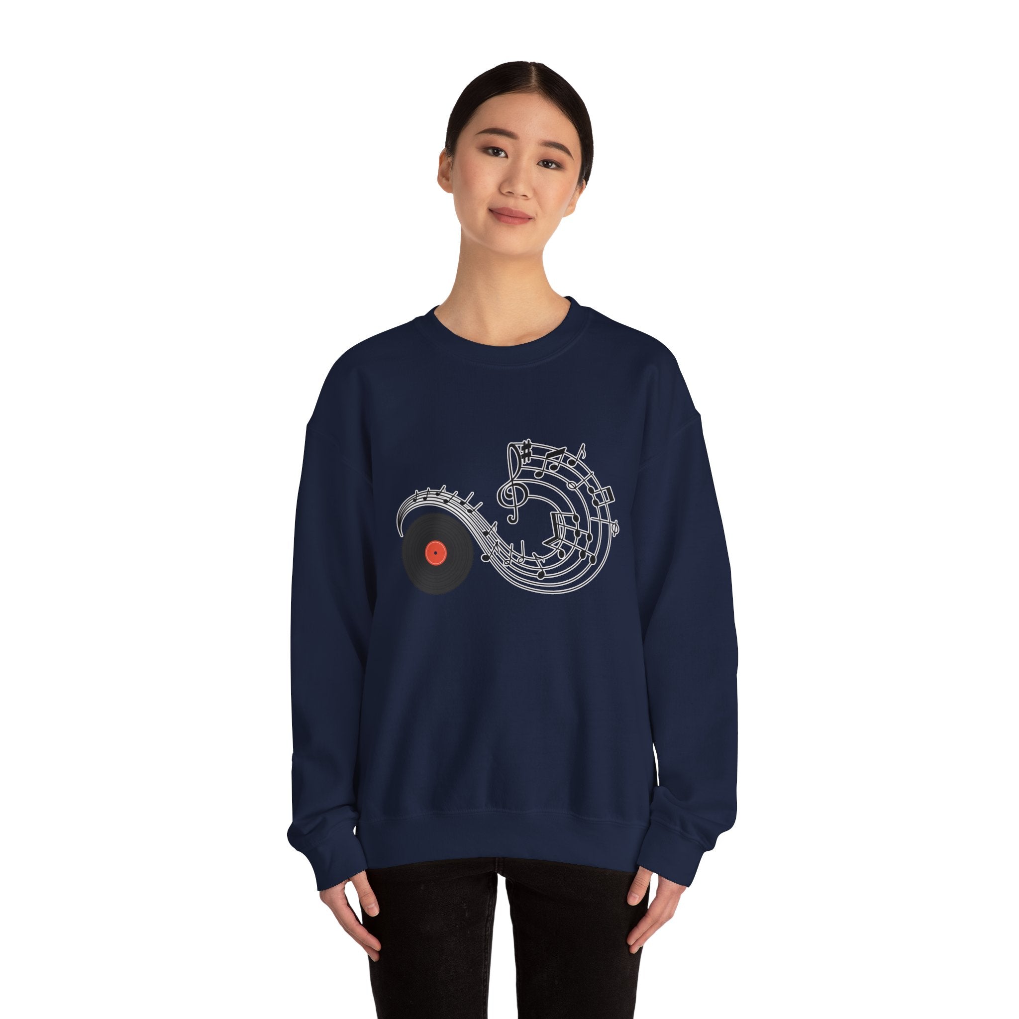 Person wearing a navy blue sweatshirt with a unique design on a white background