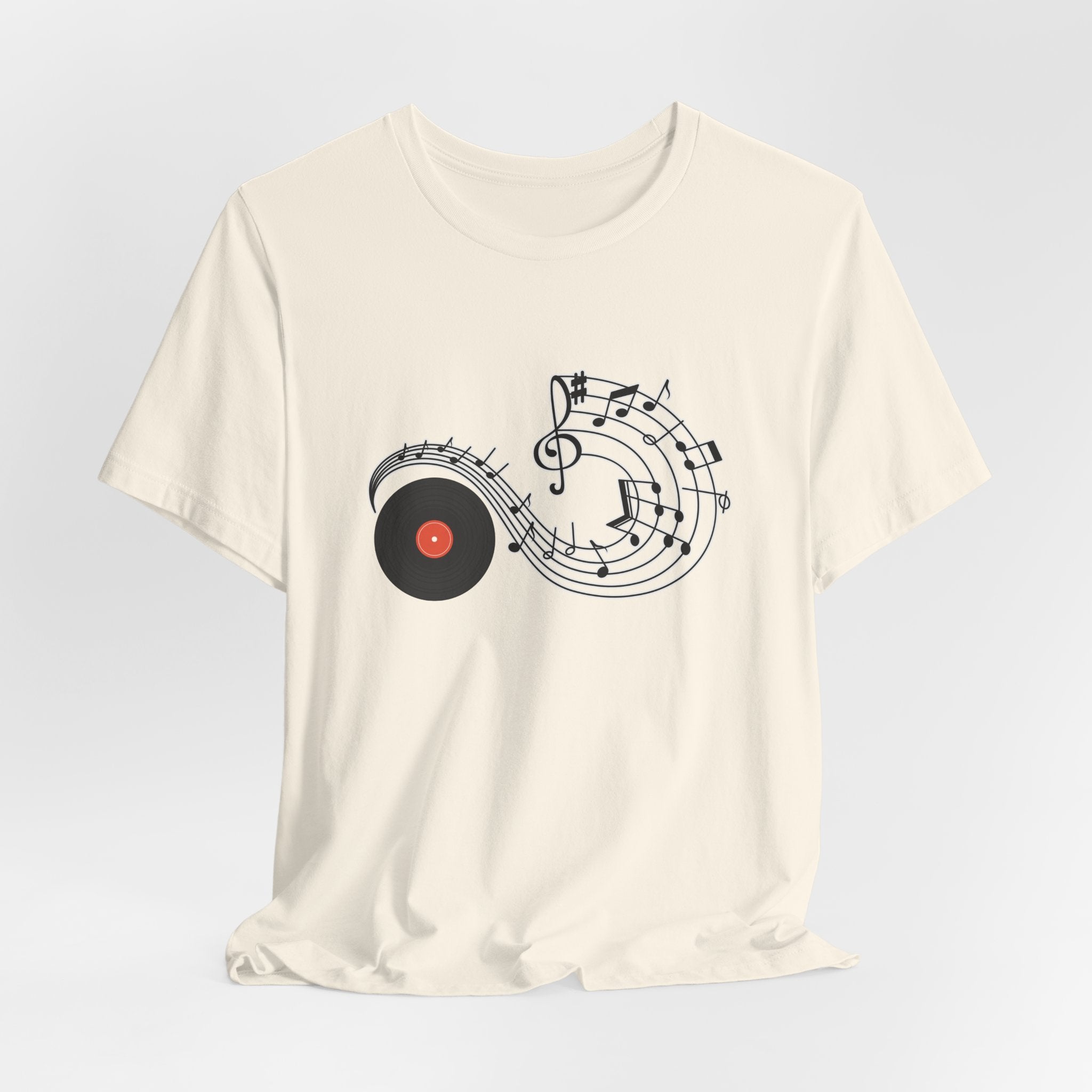 Natural ivory t-shirt with music-themed design on a light gray background