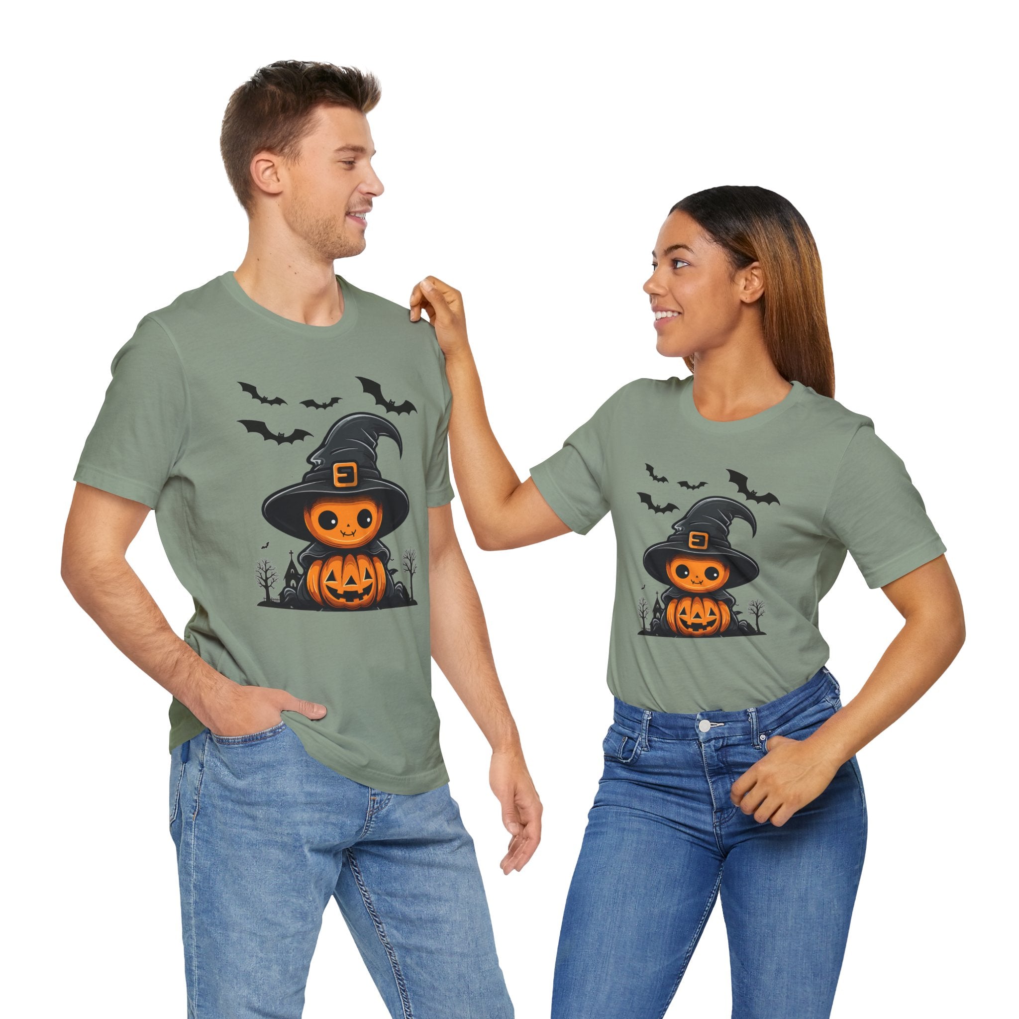 Two people wearing green t-shirts with a Halloween design on a white background