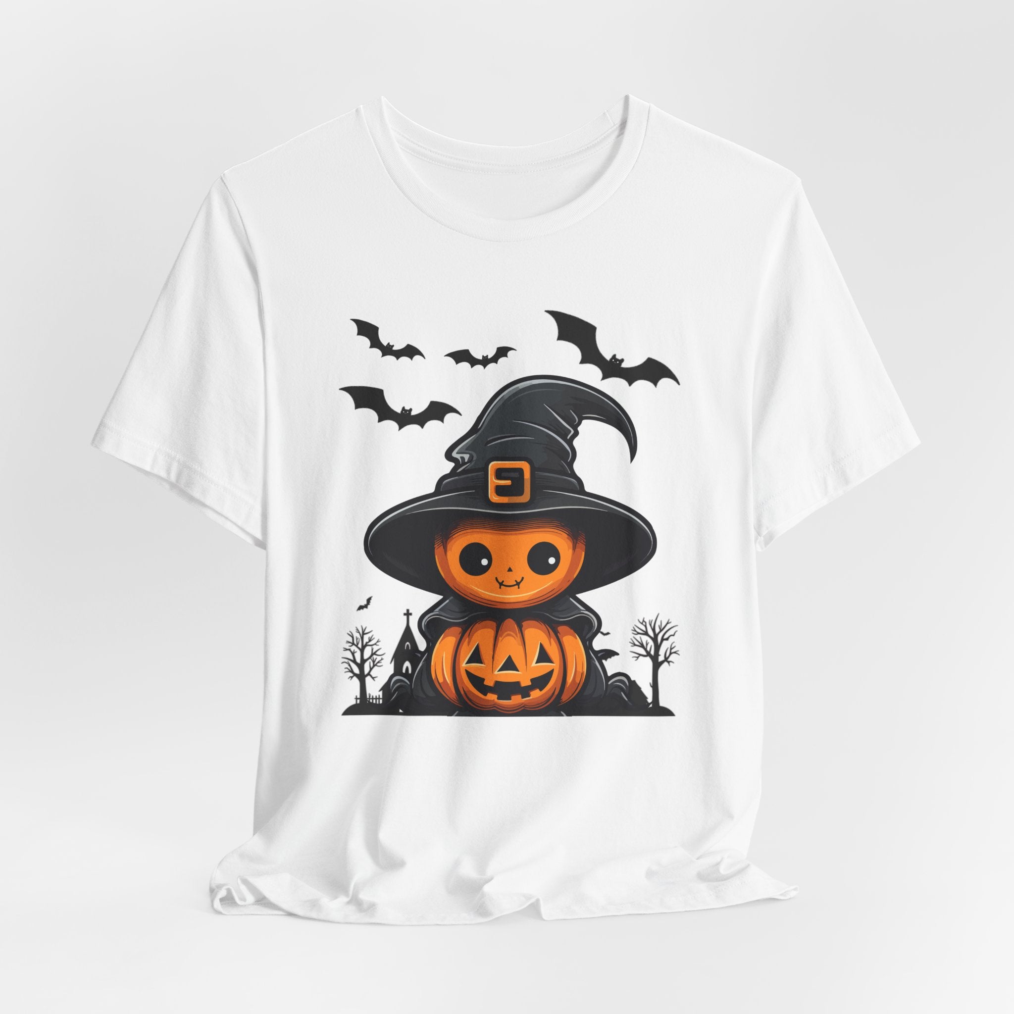 White t-shirt with a Halloween-themed design featuring a jack-o'-lantern in a witch hat.