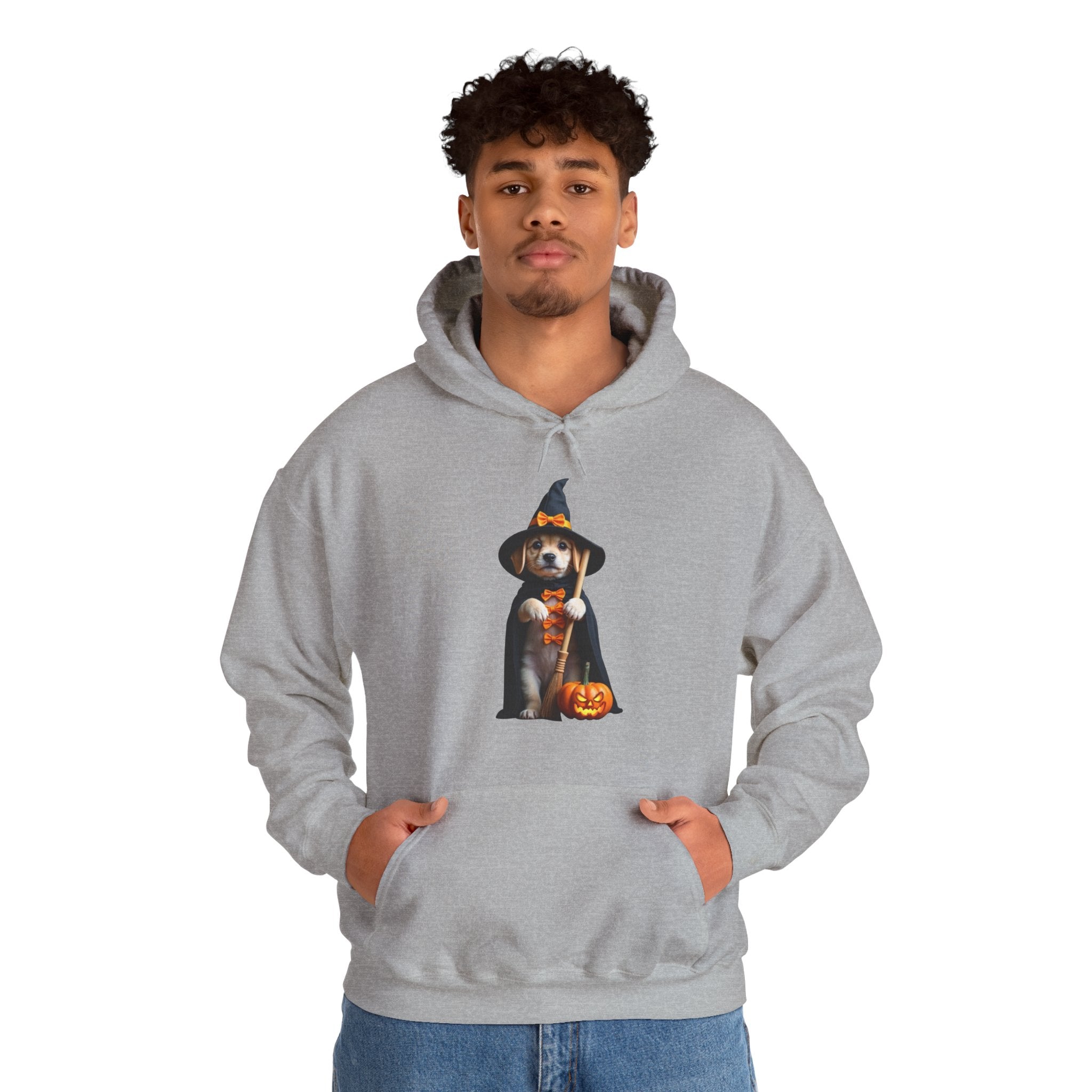 Person wearing a gray hoodie with a Halloween-themed design of a dog in a witch hat and pumpkin.