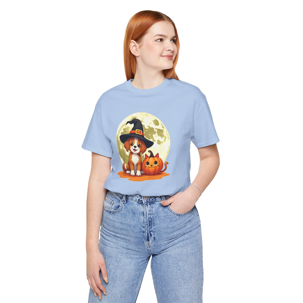Person wearing a light blue t-shirt with a Halloween-themed design of a dog and cat.