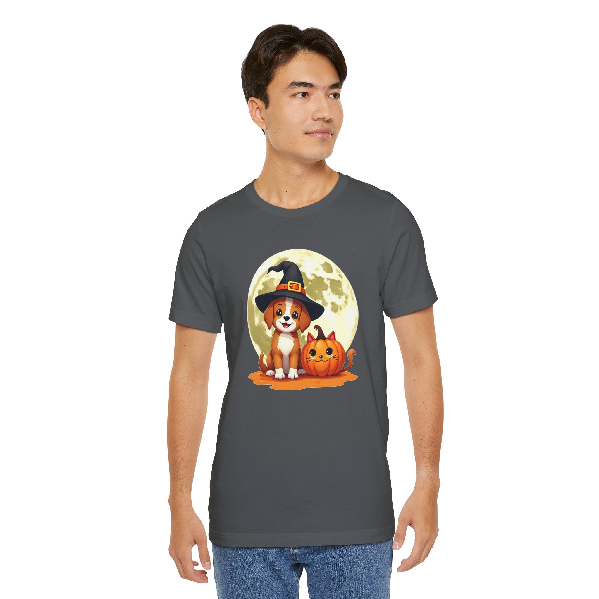 Man wearing a dark gray t-shirt with a Halloween-themed design featuring a dog in a witch hat and pumpkin.