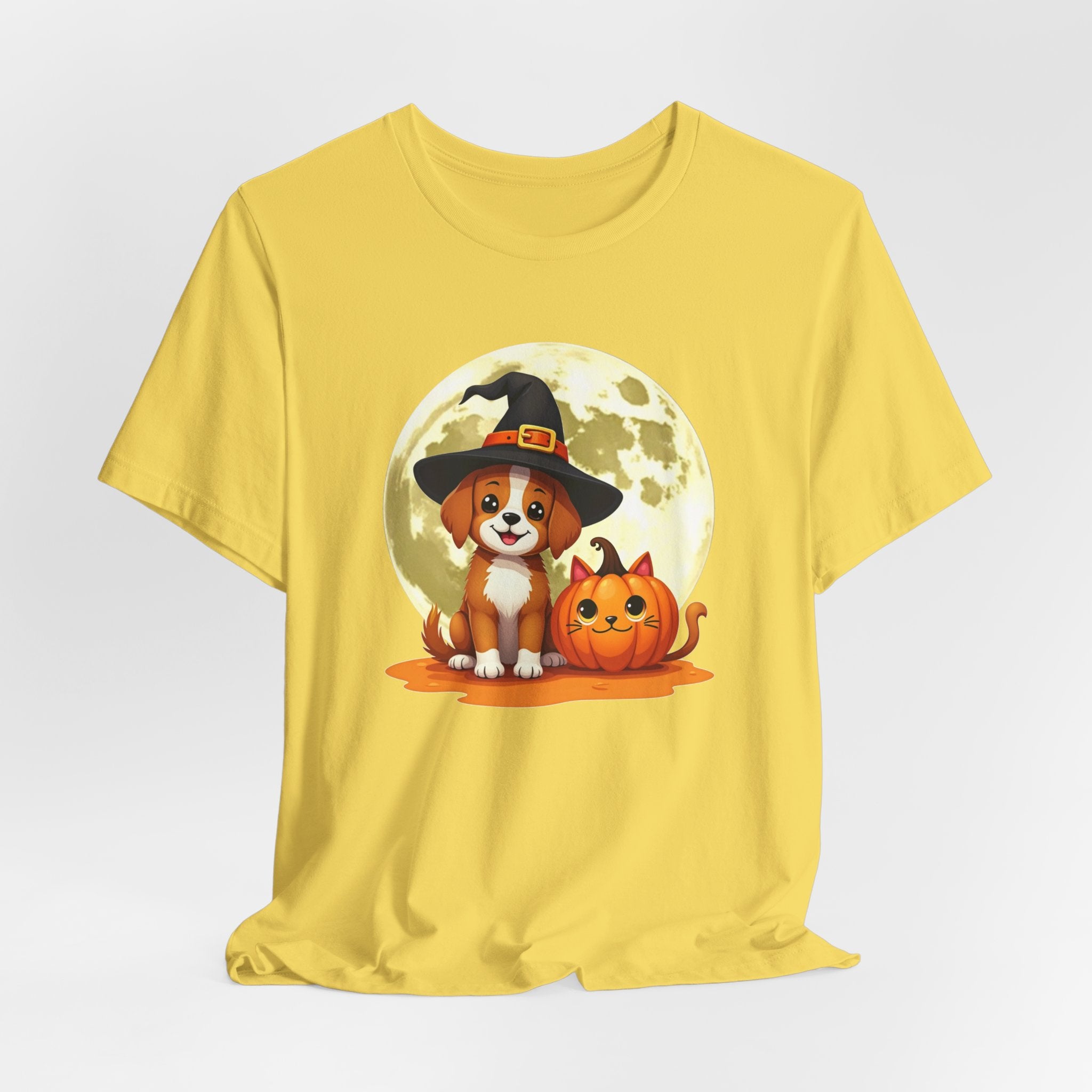 Maze yellow t-shirt with a Halloween-themed design featuring a dog in a witch hat and pumpkin.