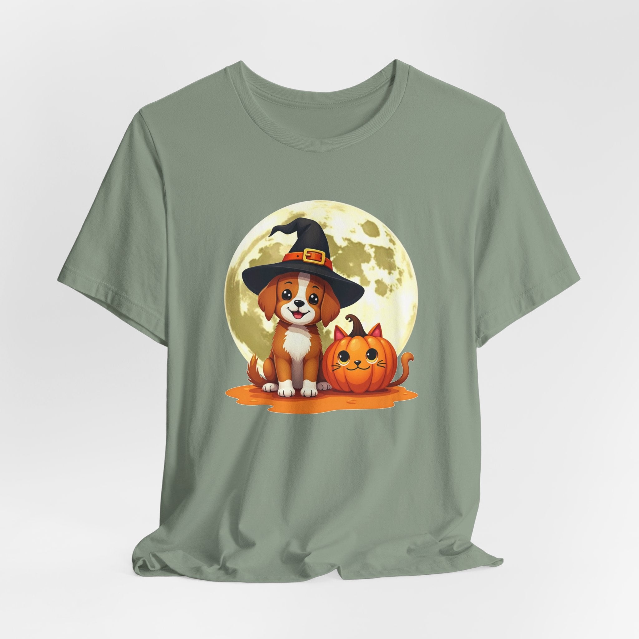 Sage green t-shirt with a Halloween-themed design of a dog in a witch hat and pumpkin.