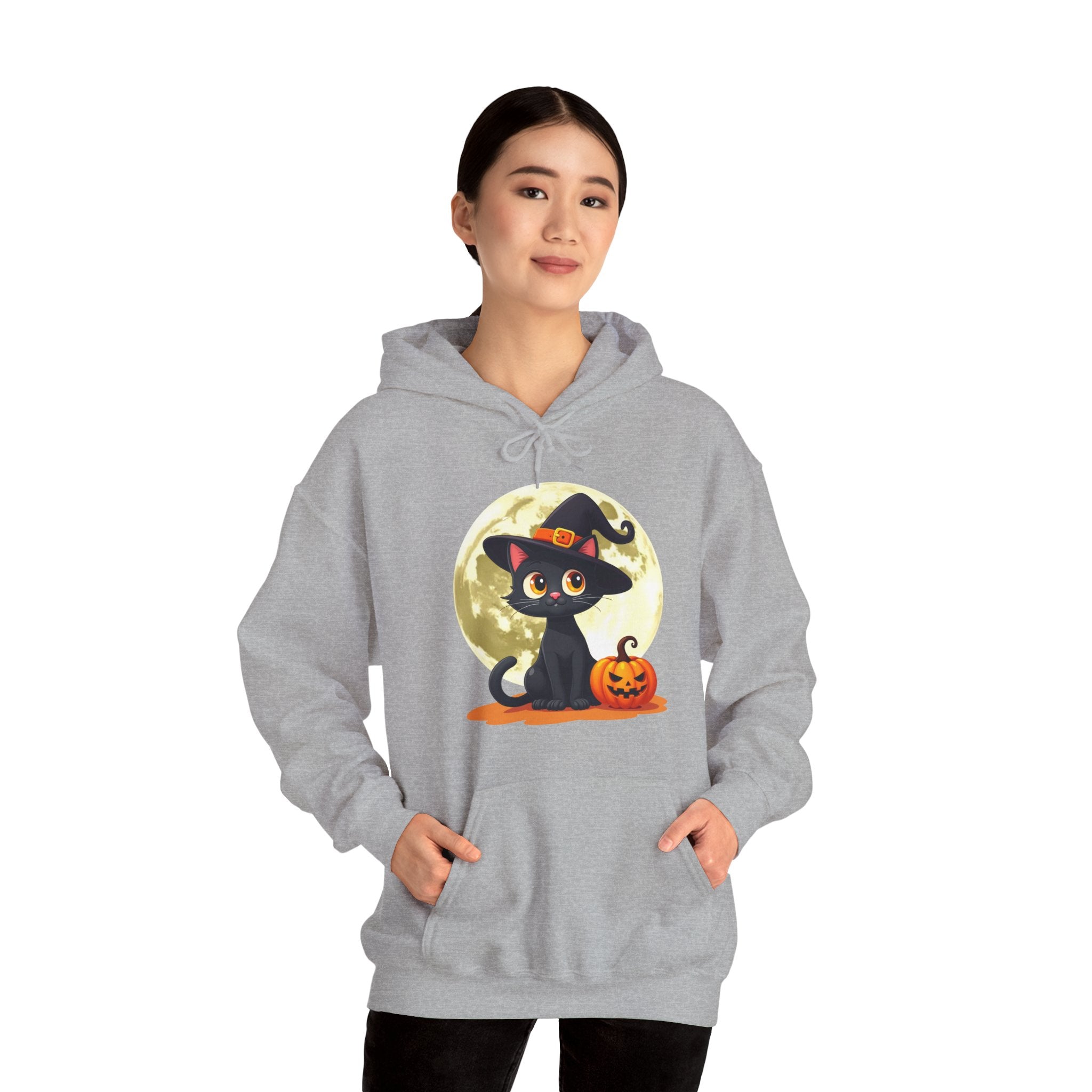 Person wearing a gray hoodie with a Halloween design of a black cat and pumpkin.