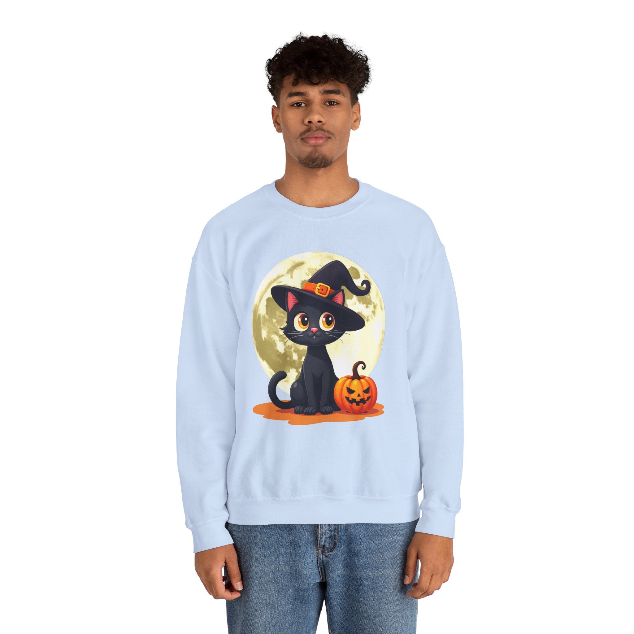 Person wearing a light blue sweatshirt with a Halloween-themed design featuring a black cat and pumpkin.