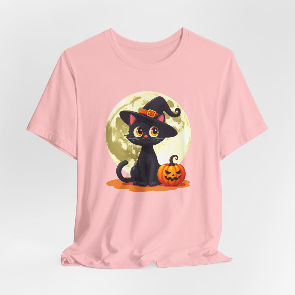 Pink t-shirt with a Halloween-themed design of a black cat in a witch hat and pumpkin on a light gray background.